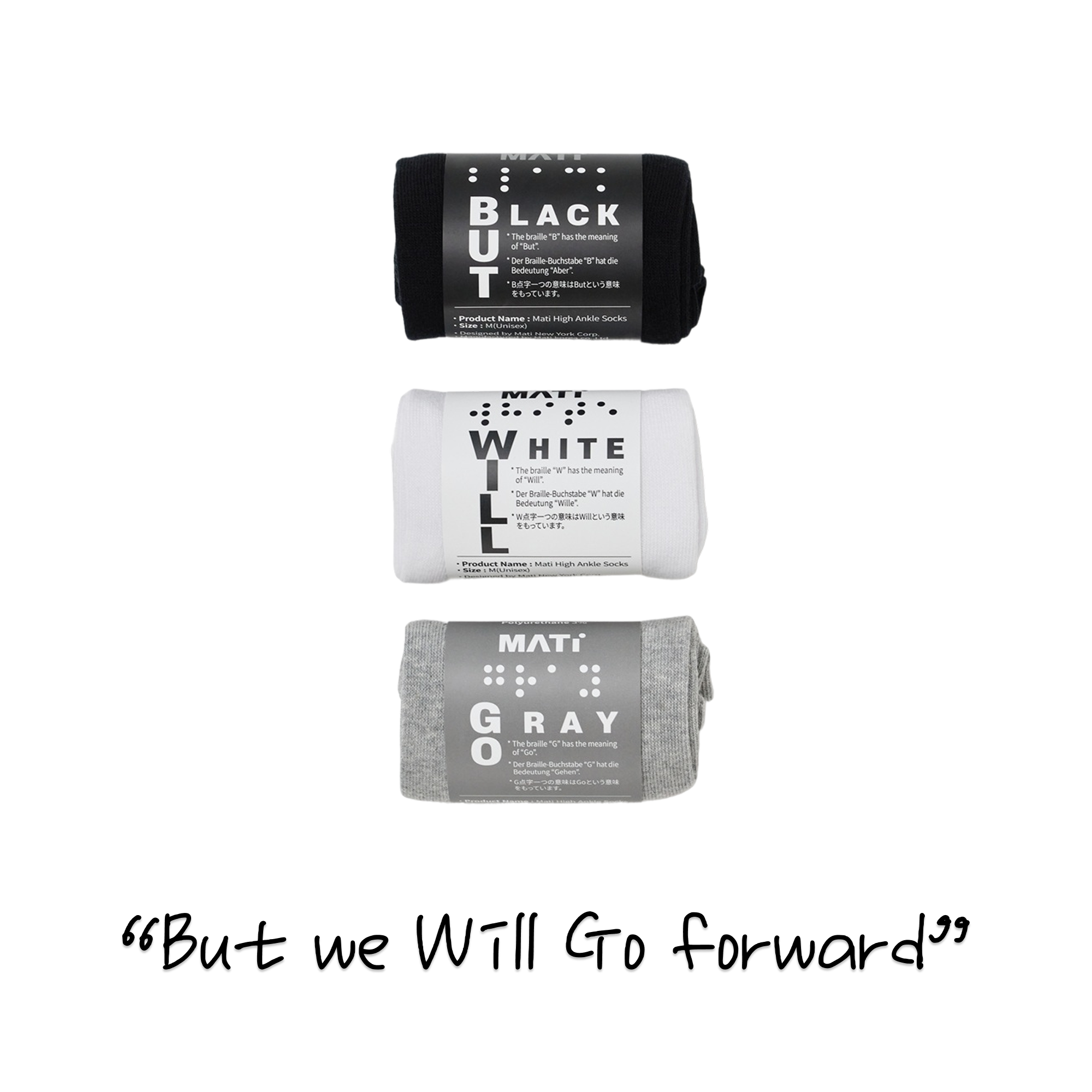 Mati New York Corp product photography shows three rolled pairs of Mati High Ankle Socks in black, white, and gray, each featuring a unique label with a large vertical word like BUT, WILL, or GO accompanied by corresponding Braille and multilingual meaning explanations, with the phrase But we Will Go forward displayed below them